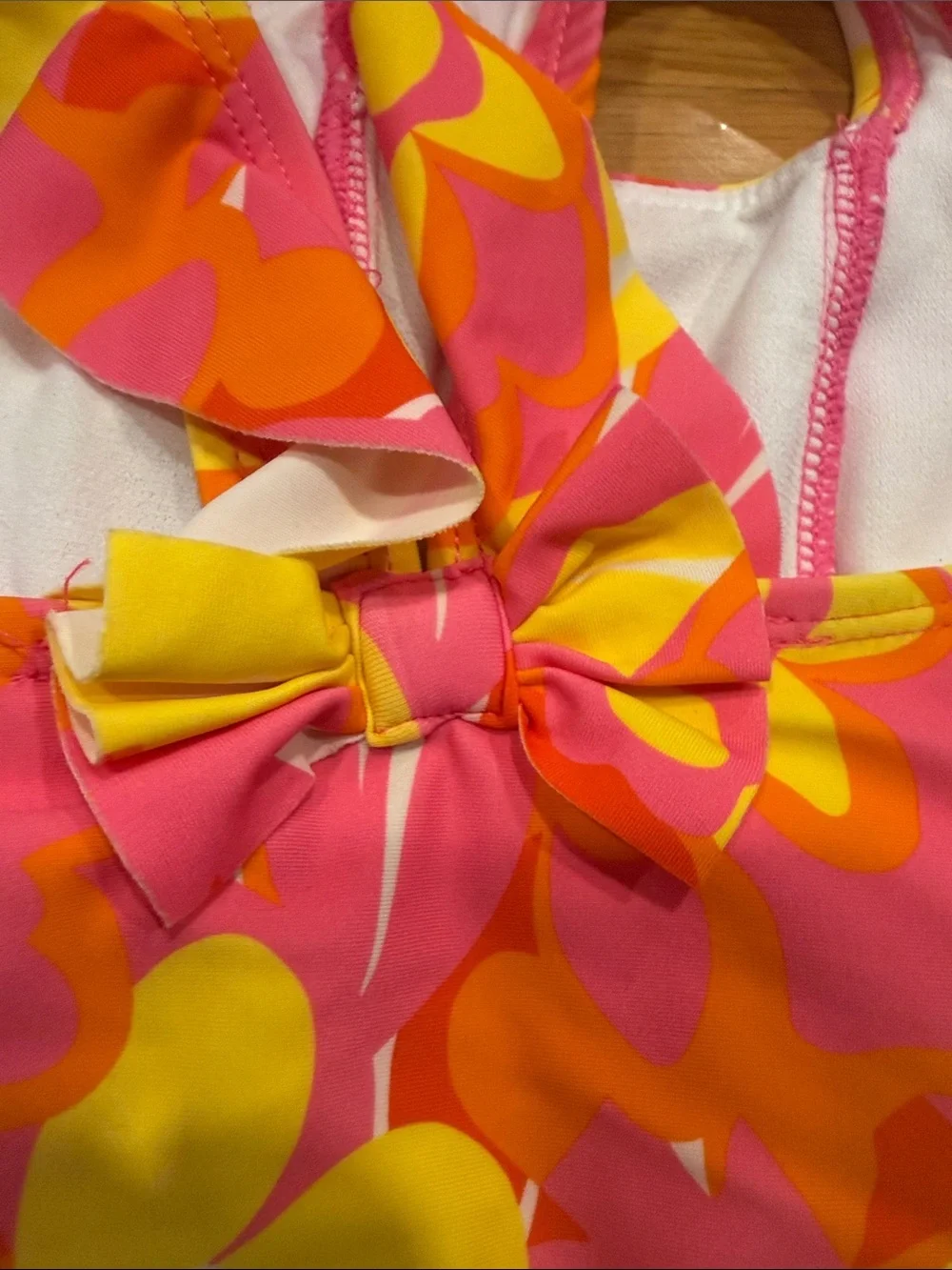 Snapper rock floral with ruffles one piece swimsuit size 18-24. Months .